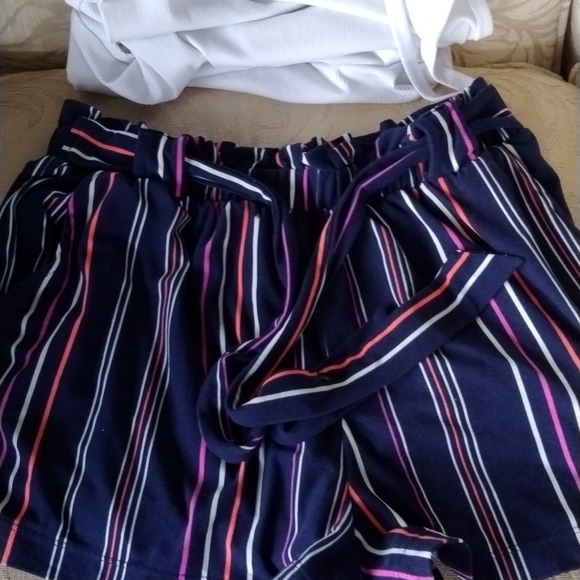 Blue short with white purple and neon orange stripes and a little white spaghett - Picture 4 of 4
